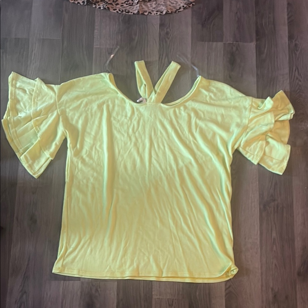 Fantastic Fawn Yellow Flutter Sleeve Blouse with Ruffled Backless Design